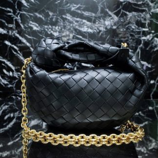 Replica Bottega Veneta Jodie mini leather top-handle bag